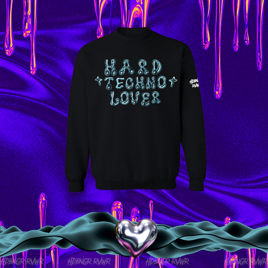Black sweatshirt with 'Hard Techno Lover' text on a dark, textured background with metallic objects.