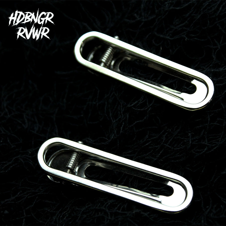 Two silver paperclip-shaped hair clips laid on dark background — Y2K Paperclip 2PC Set by HDBNGR RVWR.