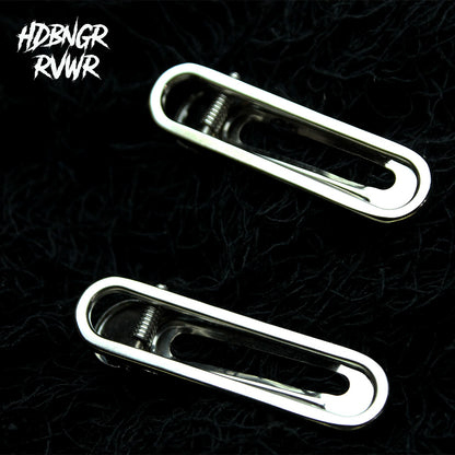 Two silver paperclip-shaped hair clips laid on dark background — Y2K Paperclip 2PC Set by HDBNGR RVWR.