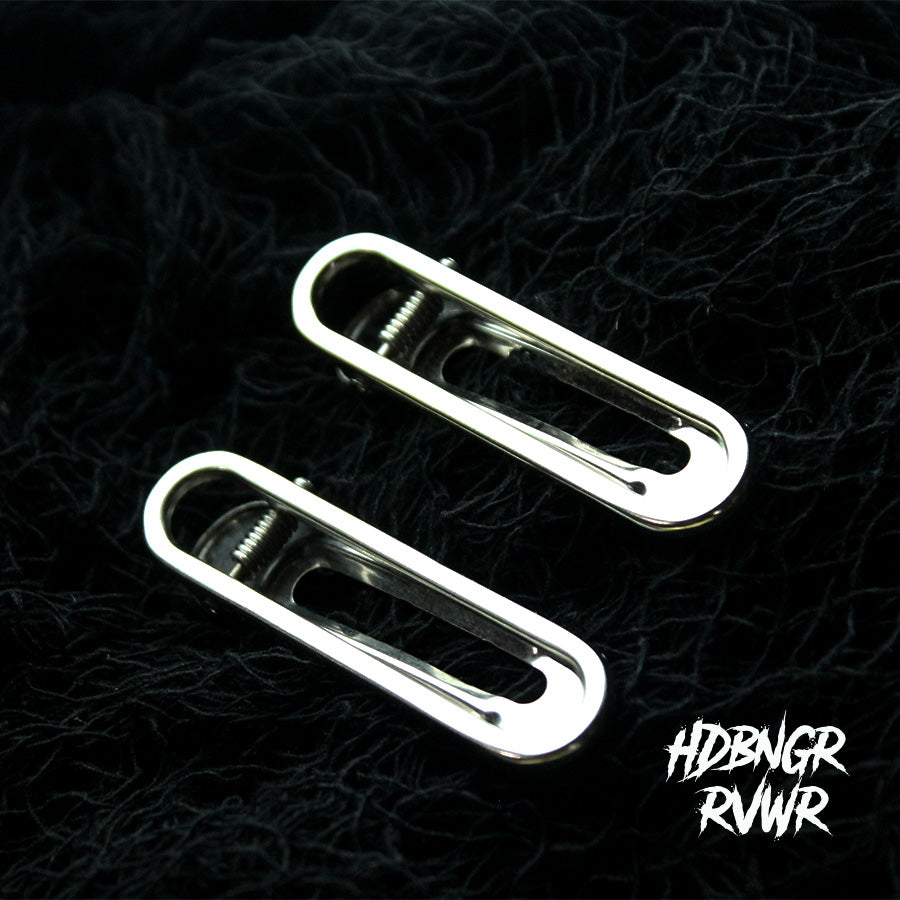 Two silver paperclip hair clips styled on dark background — Y2K Paperclip V2 2PC Set by HDBNGR RVWR.