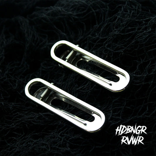 Two silver paperclip hair clips styled on dark background — Y2K Paperclip V2 2PC Set by HDBNGR RVWR.