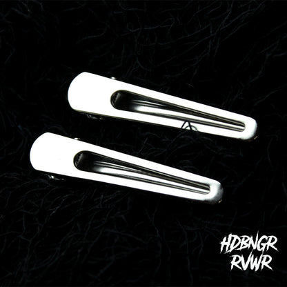 Two rounded open-oval silver hair clips laid on dark background — Y2K The Original 2PC Set by HDBNGR RVWR.